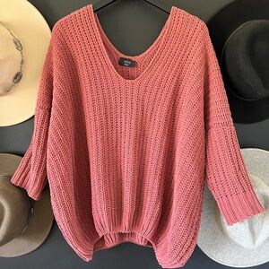 Soft orange knit sweater